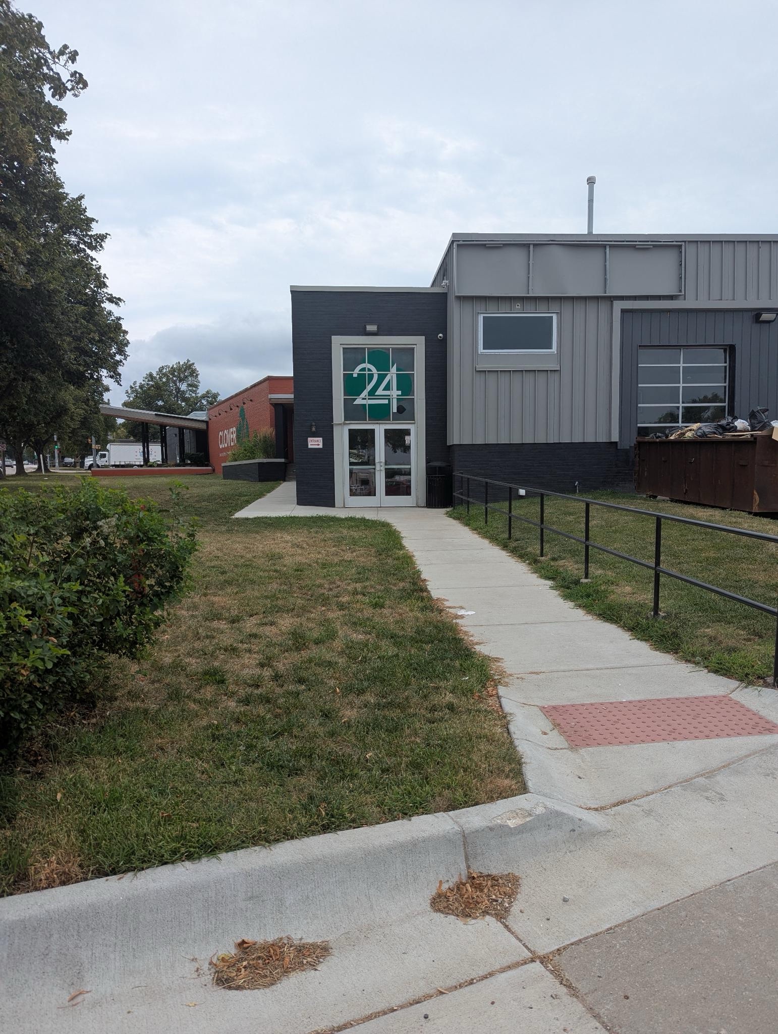 A photo of the sidewalk leading up the Clover 24