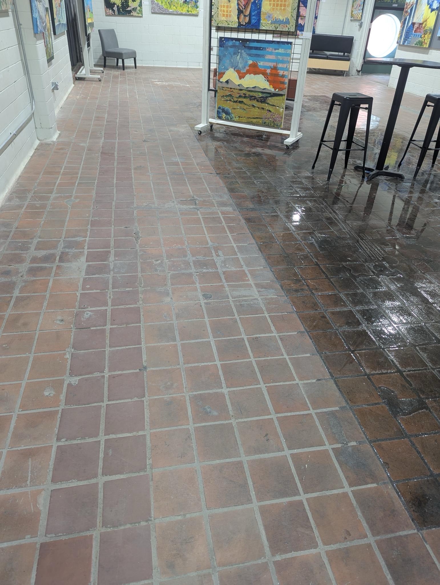 A photo showing the tiled floor in the main gallery at Clover24. 
