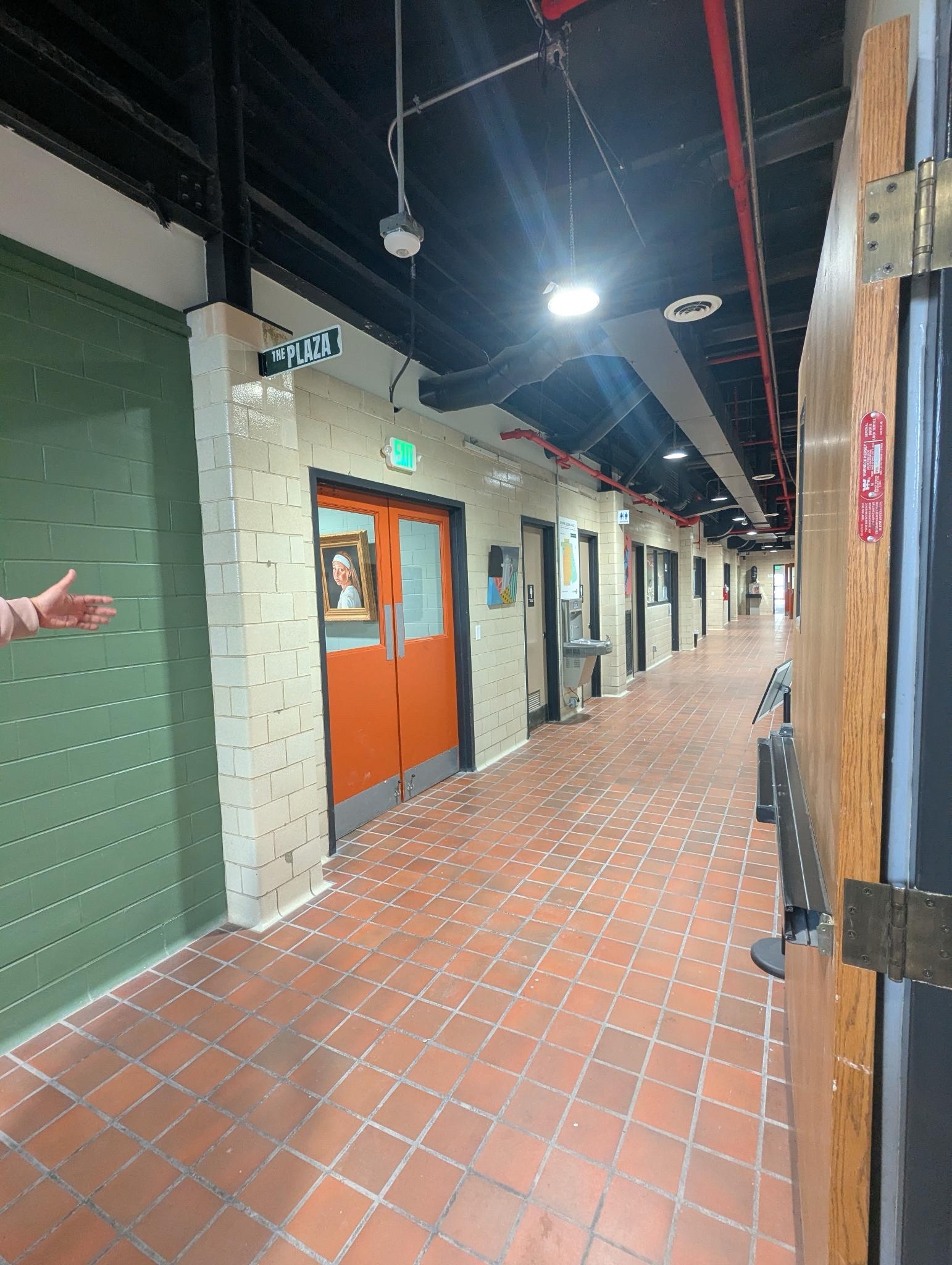 A photo of a tiled hallway at clover 24
