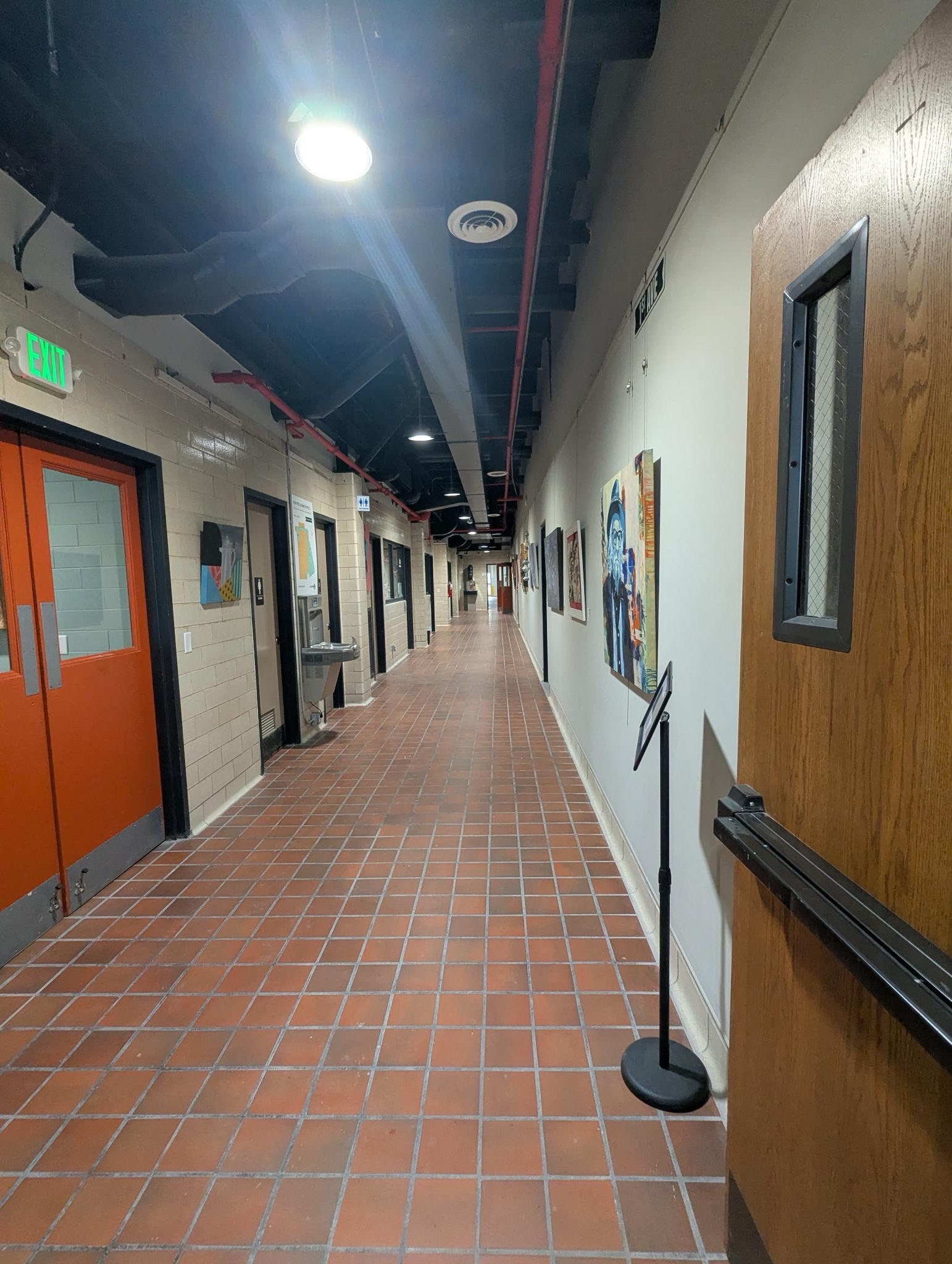 A photo of a tiled hallway at Clover24